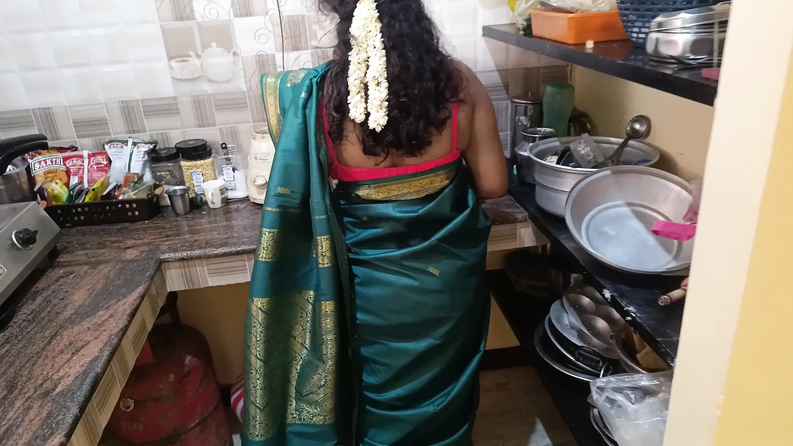 Housewife works at home with stepsister and her husband