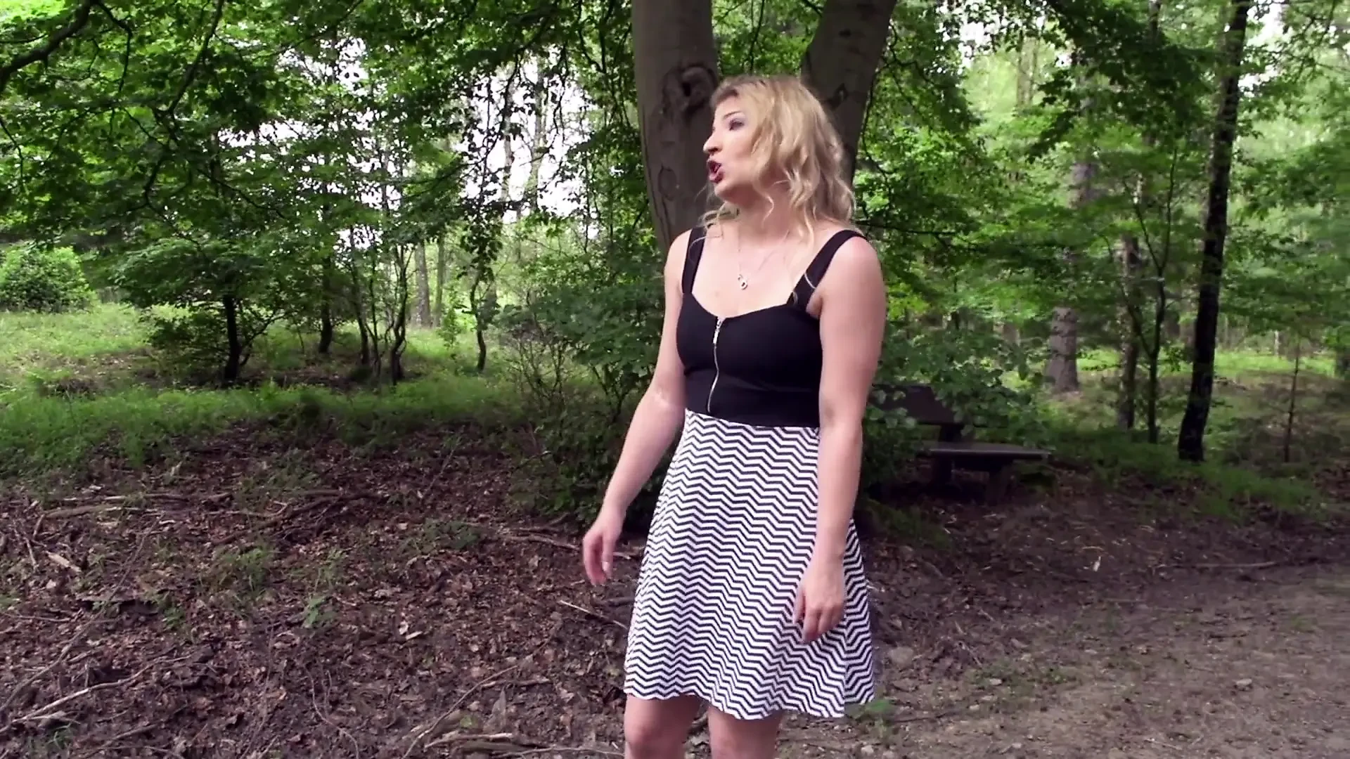 Lovely blonde gets sprayed on her tits outdoor