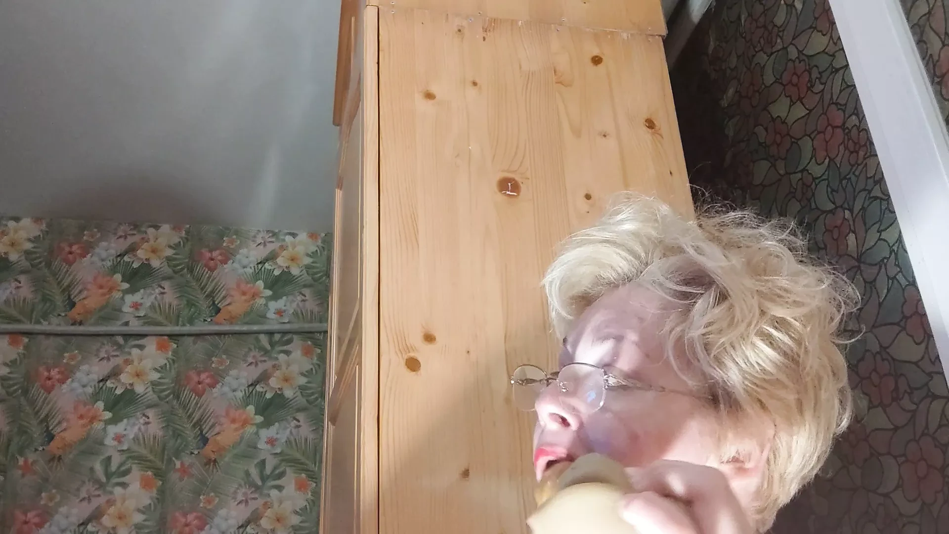 Fucking a dildo standing on the wall