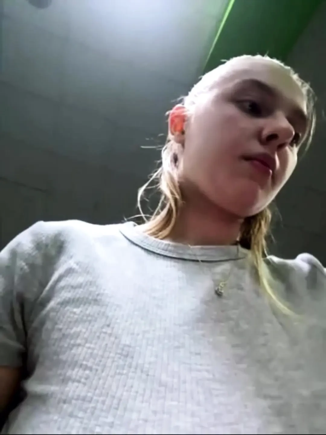 Public masturbation: A horny beauty at the FIT gym massages her pussy and cums on a bench in the locker room.