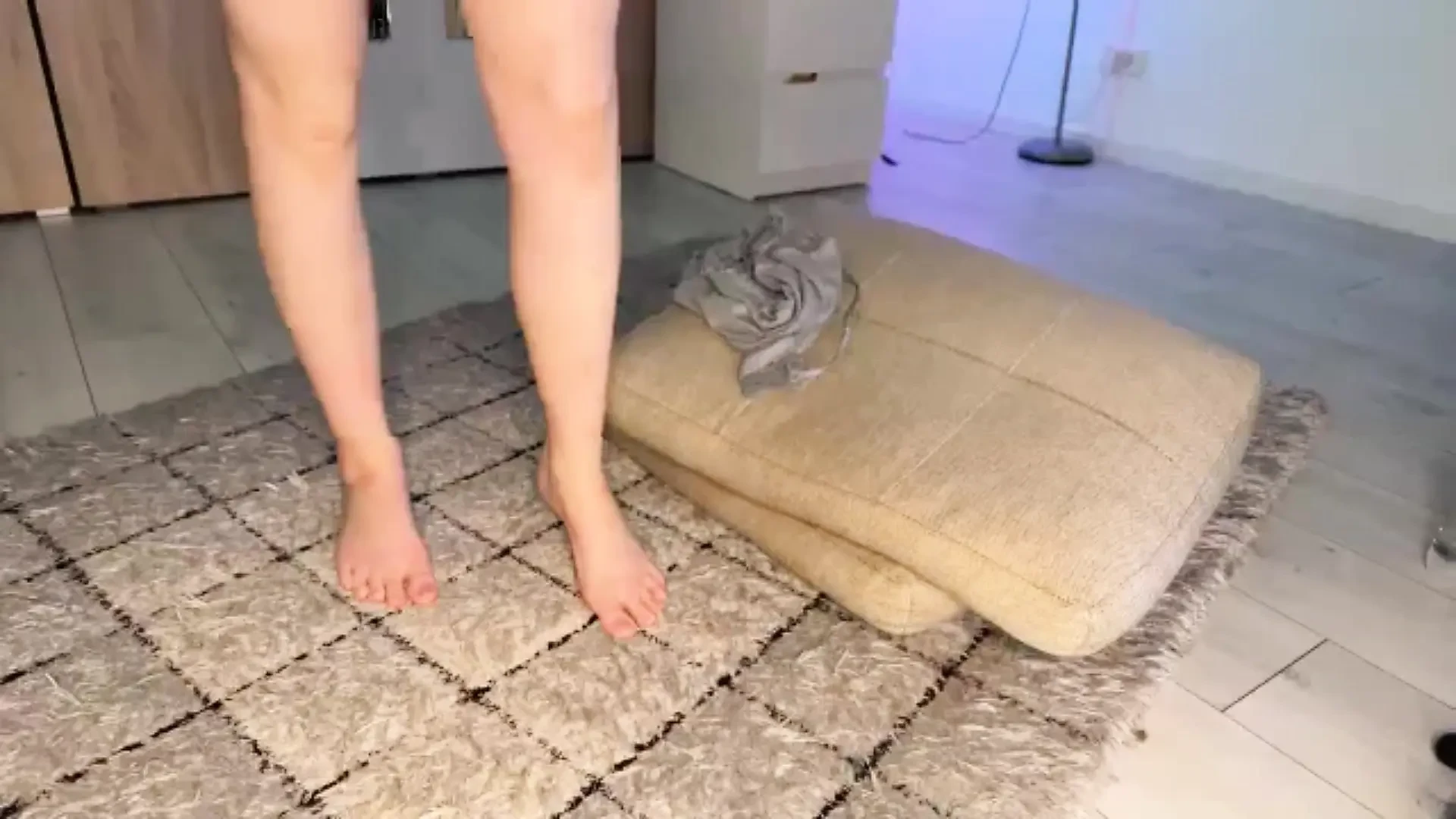 Nude blonde with natural breasts playing