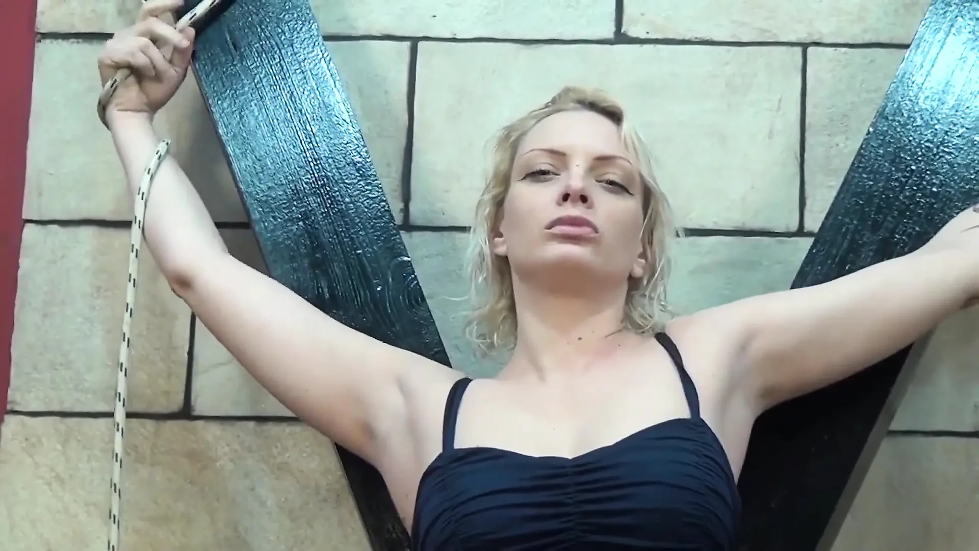 Blindfolded blonde gets punishment