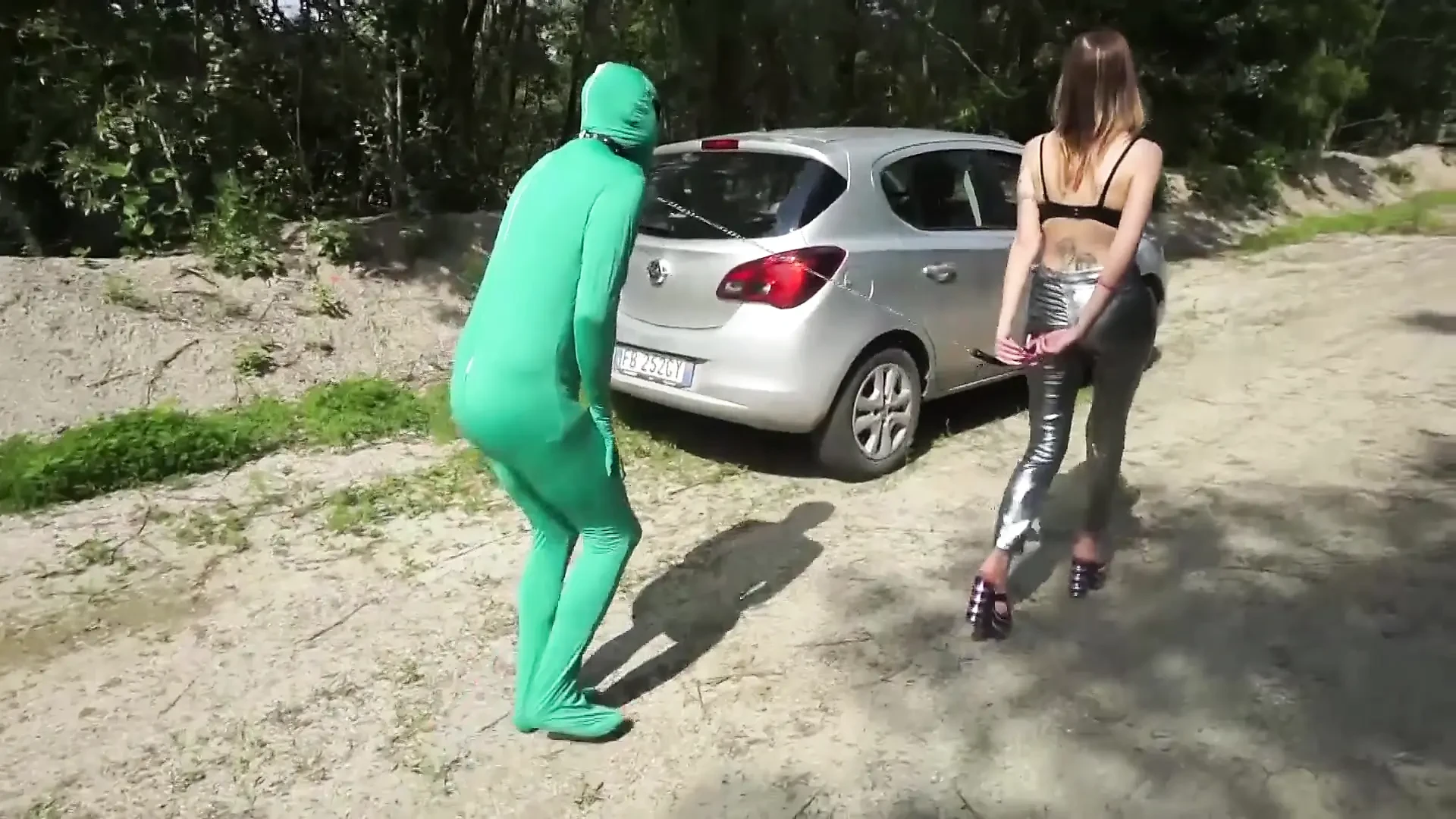 Suited slave gets punished outdoor from femdom chick